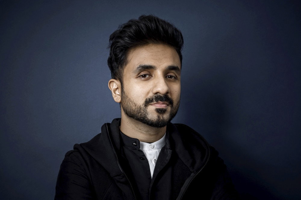 Vir das pic having a blue background and smiling