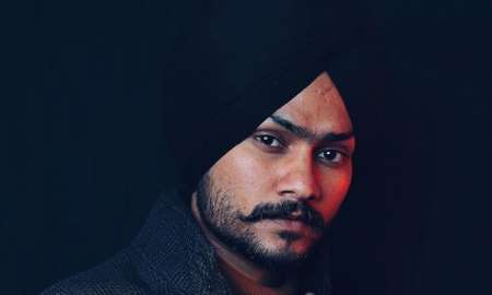 Himmat Sandhu Posing for the image.