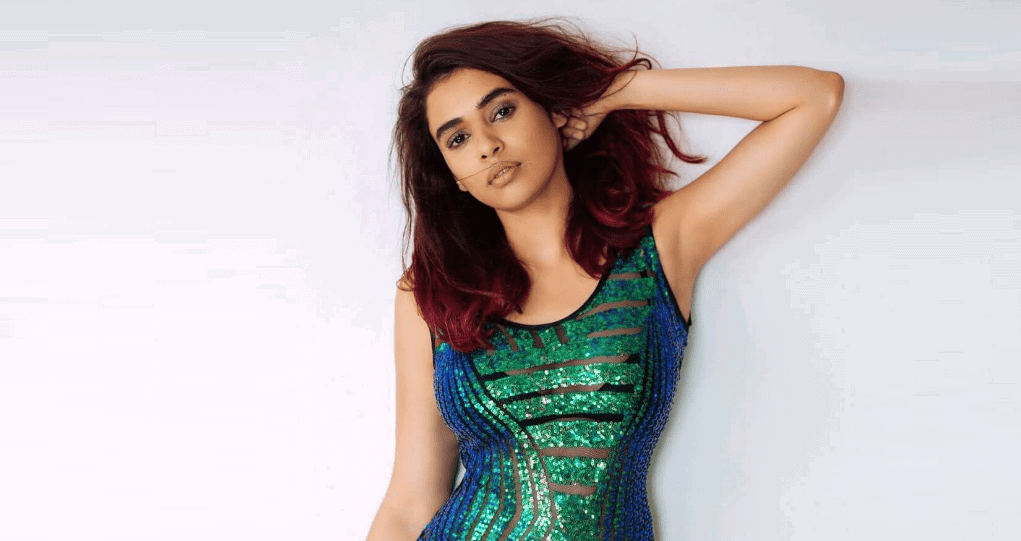 Shamali posing for image