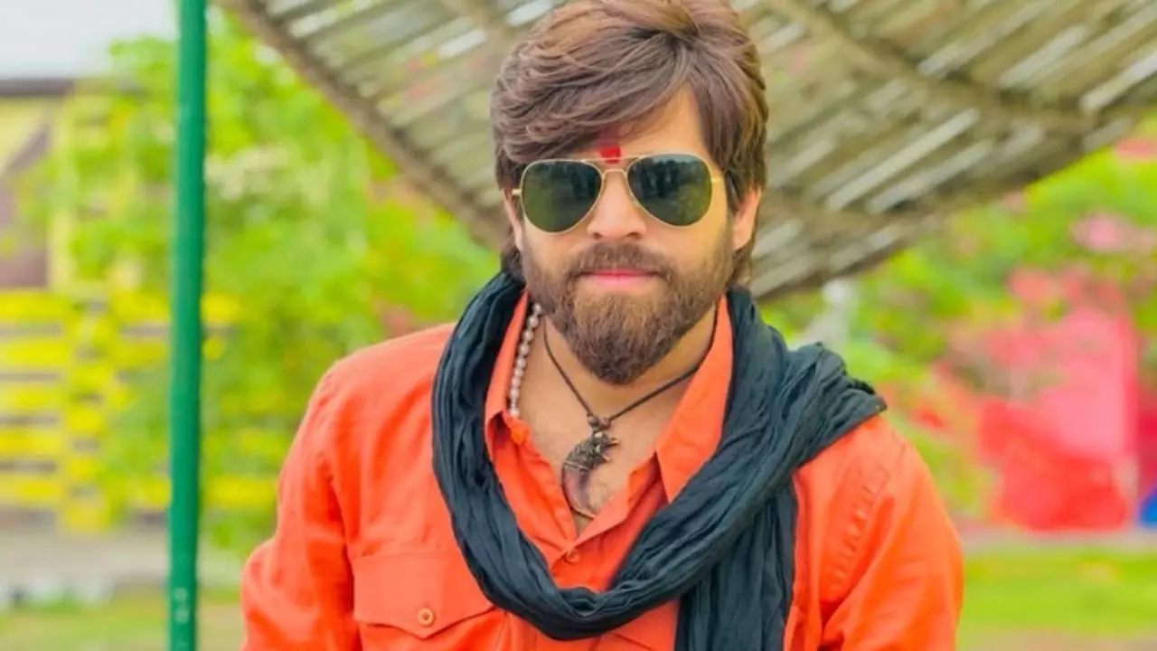 Masoom haryanvi singer posing for the image.