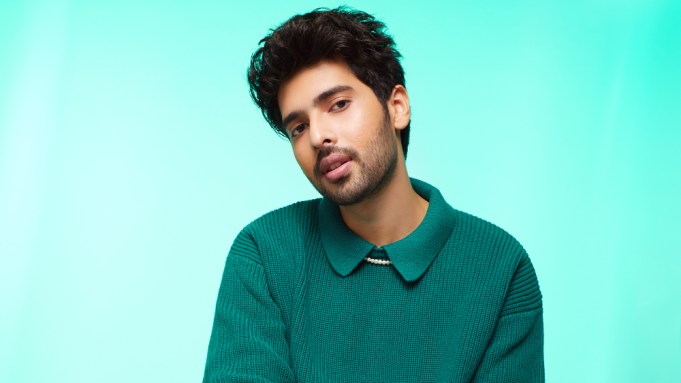 Arman Malik posing for the image