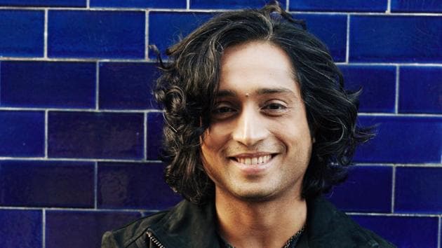 Nikhil posing for the image who is a singer.
