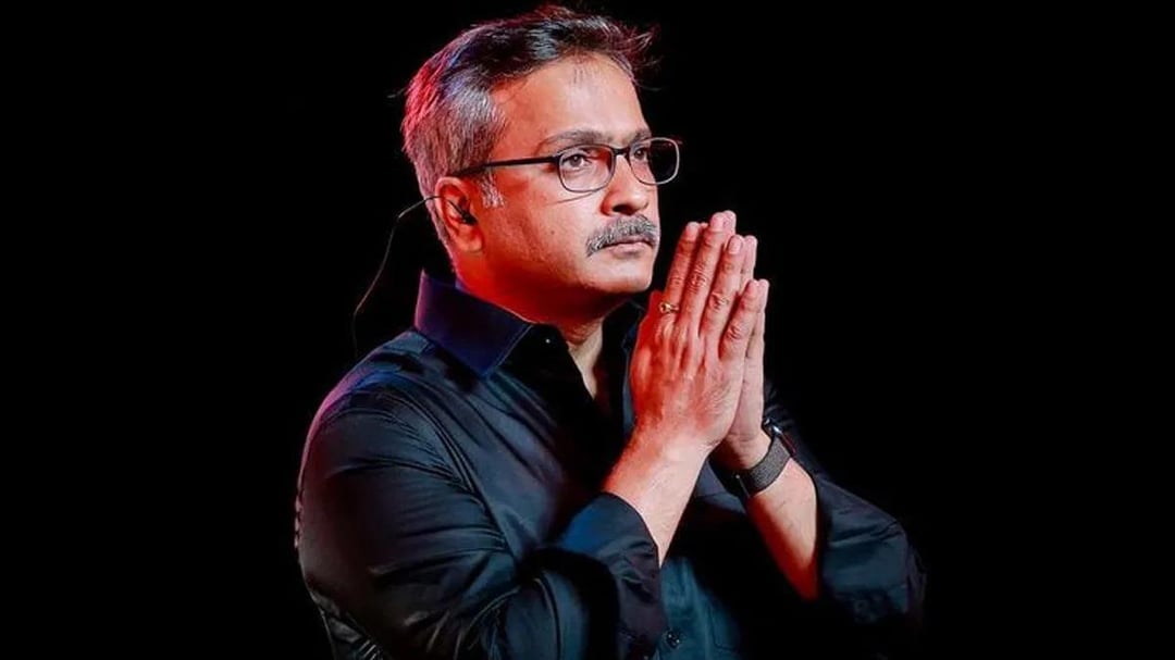 S.P. Charan posing for the image.