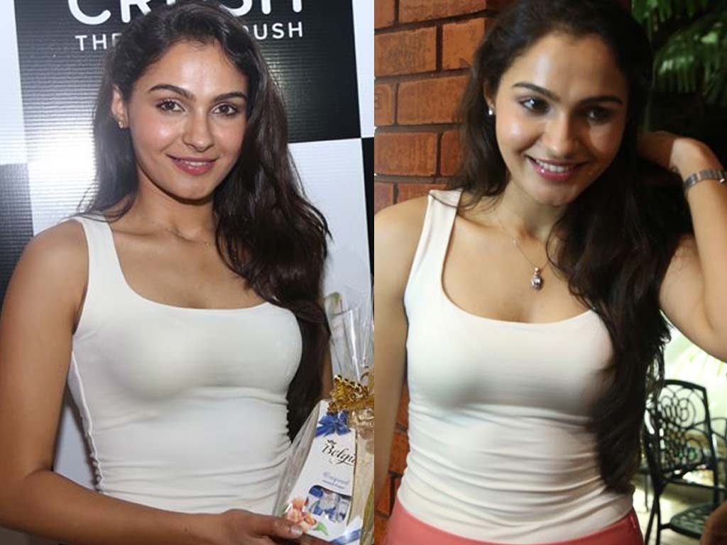 andrea-jeremiah posing for the image.